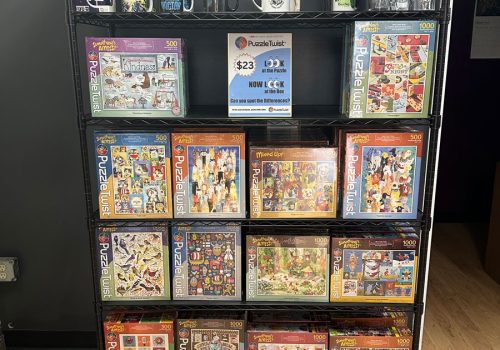 Shelves with UK-themed mugs and puzzles.
